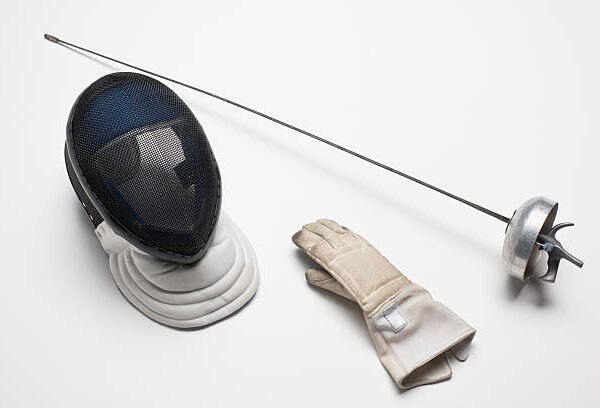 "Fencing gear - equipment.  Fencing eppe - sword,  mask and glove on white background.  Very shallow DOF . The grain and texture added.SEE ALSO:"